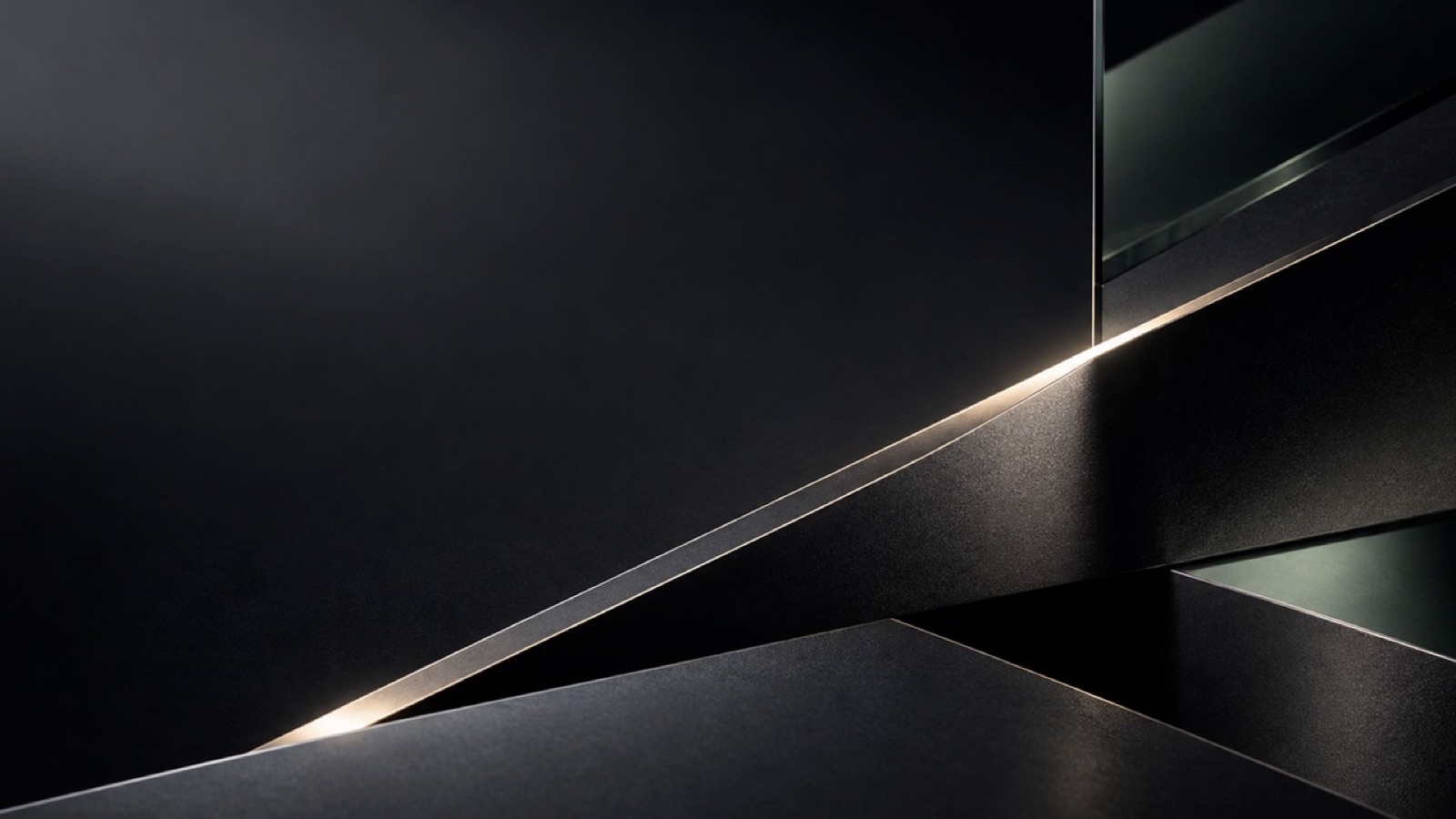 Dark faceted panels reflecting a narrow line of light